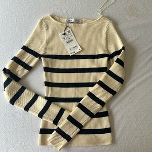 New with tags, Zara sweater, boat neck cream with navy stripes. Runs small.